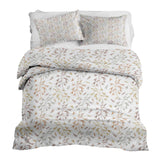 Therapy blanket and bedding set with delicate, colorful branches.