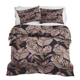 Therapy blanket and bedding set, black with purple leaves.