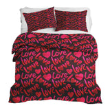 Therapy blanket and bedding set, black with "Love" lettering.
