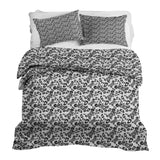 Therapy blanket bedding set with the inscription "Joker" in black.