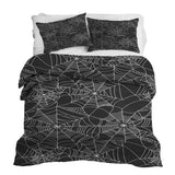Therapy blanket bedding set, black with spiderweb pattern.