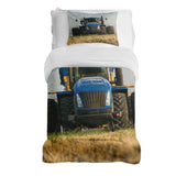 Therapy blanket and bedding set, tractor design in blue.