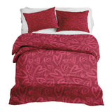 Therapy blanket and bedding set, red with pink heart motif.