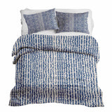 Therapy blanket and bedding set with blue dots.