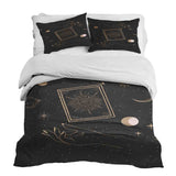Therapy blanket and bedding set, black with sun, moon and stars.
