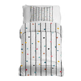 Therapy blanket and bedding set with colorful dots.