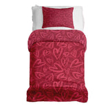 Therapy blanket and bedding set, red with pink heart motif.