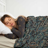 Therapy blanket and bedding set with green Hawaiian pattern.