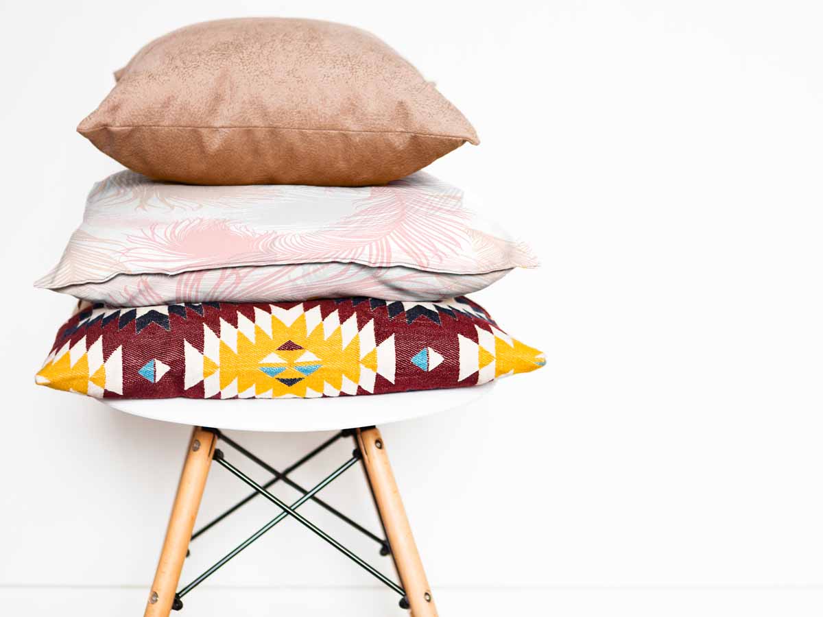 Health pillow white with pink feathers