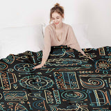 Therapy blanket and bedding set with green Hawaiian pattern.