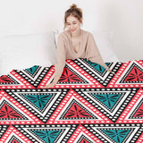 Therapy blanket and bedding set with colorful triangles