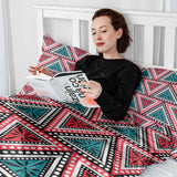 Therapy blanket and bedding set with colorful triangles