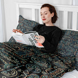 Therapy blanket and bedding set with green Hawaiian pattern.