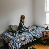 Therapy blanket and bedding set with blue dots.