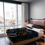Therapy blanket bedding set, black, with game consoles.