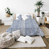 Therapy blanket and bedding set with blue dots.