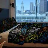 Therapy blanket bedding set, black, with game consoles.
