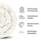 Therapy blanket and bedding set, white with yellow stars.