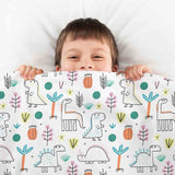 Therapy blanket and bedding set with colorful dinosaurs