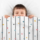 Therapy blanket and bedding set with colorful dots.