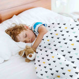 Therapy blanket and bedding set with small fir trees.
