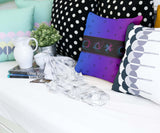 Purple health pillow with shapes