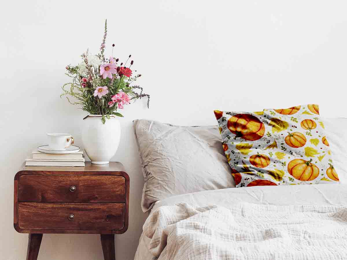 Coussin de santé blanc avec de grosses citrouilles