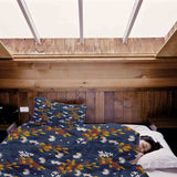 Therapy blanket and bedding set, blue with bouquet of flowers.