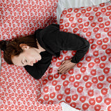 Therapy blanket bedding set with speech bubble and heart.