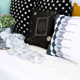 Health pillow black with sun, moon and stars