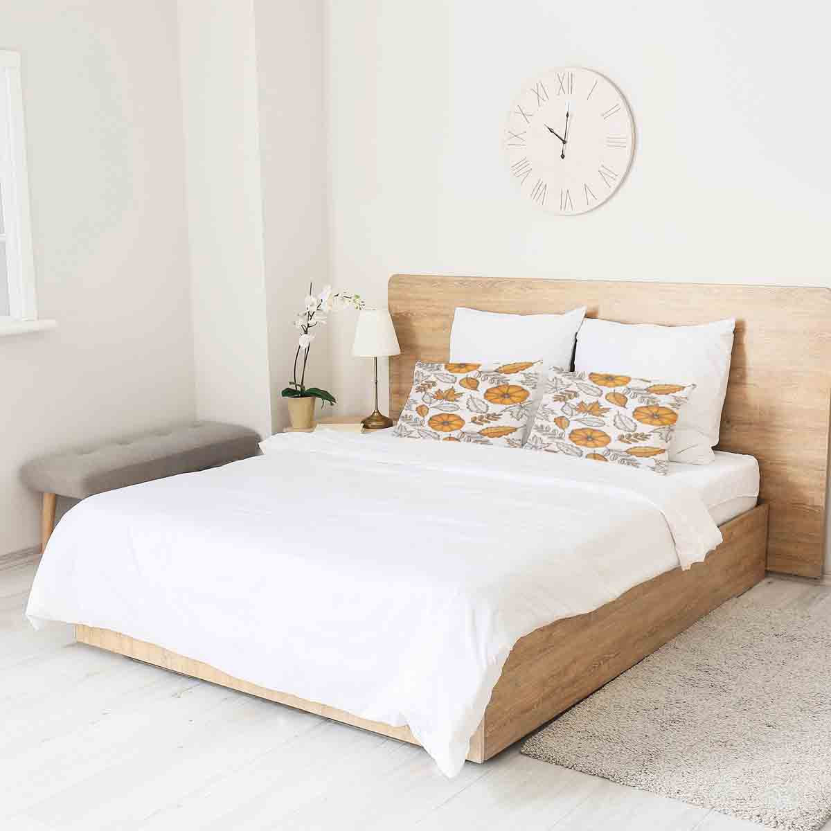 Coussin de santé blanc avec feuille et citrouille