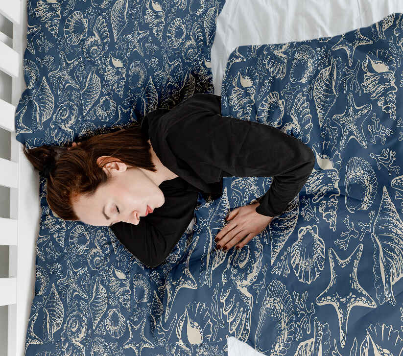 Ensemble de literie avec couverture thérapeutique bleu avec coquillages