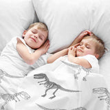 Therapy blanket bedding set, white with dinosaur skeleton.