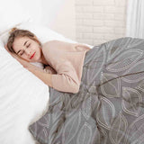 Therapy blankets and bedding set, grey with white palm leaves.