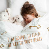 Therapy blanket and bedding set, white with flying key.