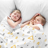 Therapy blanket and bedding set, white with yellow triangles.