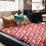 Therapy blanket bedding set with speech bubble and heart.