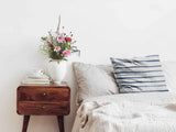 Health pillow with blue horizontal stripes