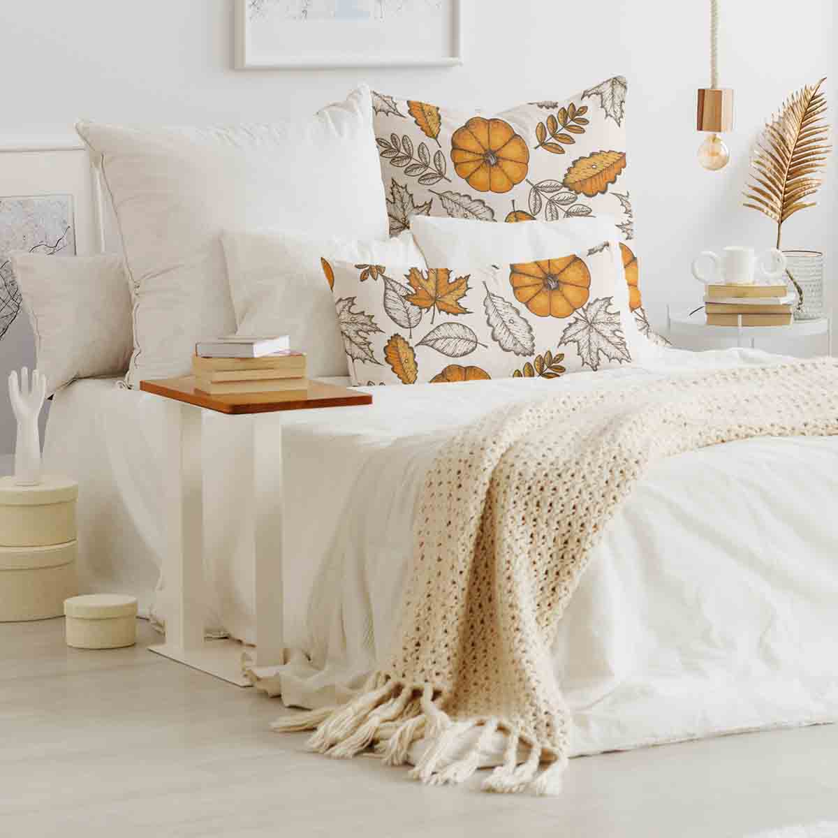 Coussin de santé blanc avec feuille et citrouille