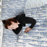 Therapy blanket and bedding set with blue pattern.