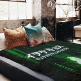 Therapy blanket and bedding set in green with lettering.