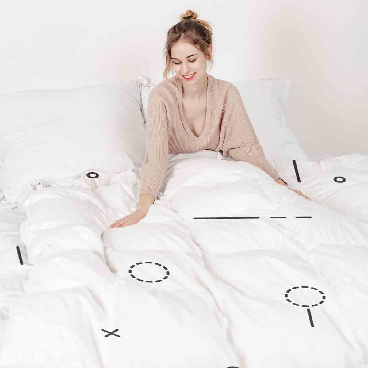 Ensemble de literie avec couverture thérapeutique blanc avec formes noires