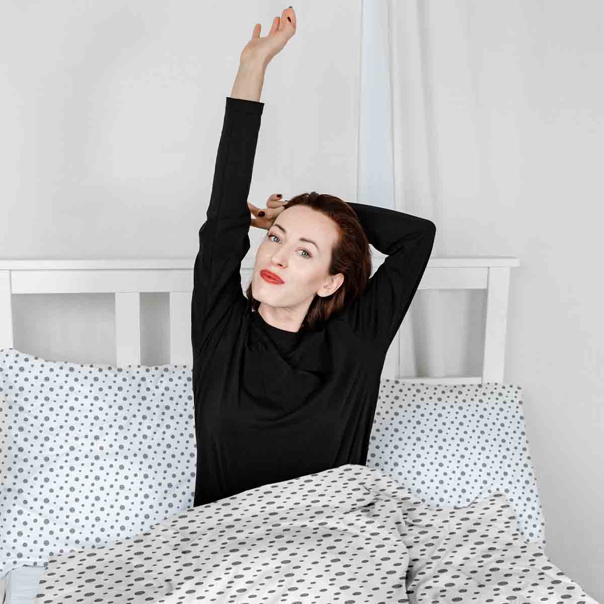 Ensemble de literie avec couverture thérapeutique blanc avec de nombreux points gris