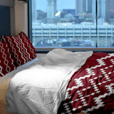 Therapy blanket and bedding set with red Christmas pattern.