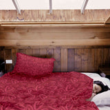 Therapy blanket and bedding set, red with pink heart motif.