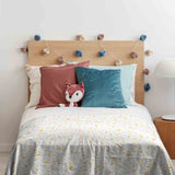 Therapy blanket and bedding set, white with yellow stars.