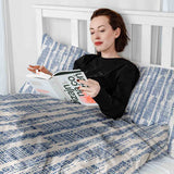 Therapy blanket and bedding set with blue pattern.