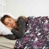 Therapy blanket and bedding set with a sea of purple flowers.
