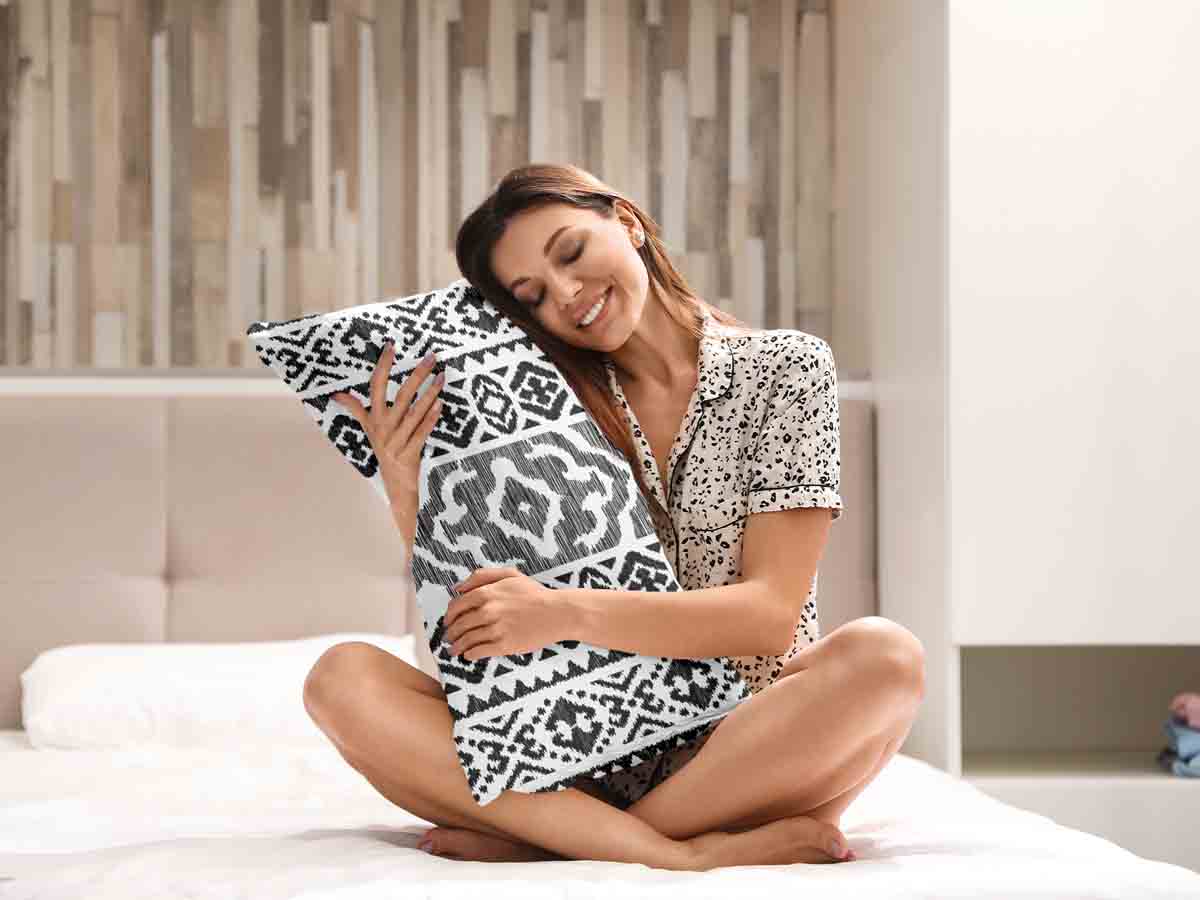 Health pillow with black shapes