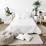 Therapy blanket and bedding set, white with black shapes.